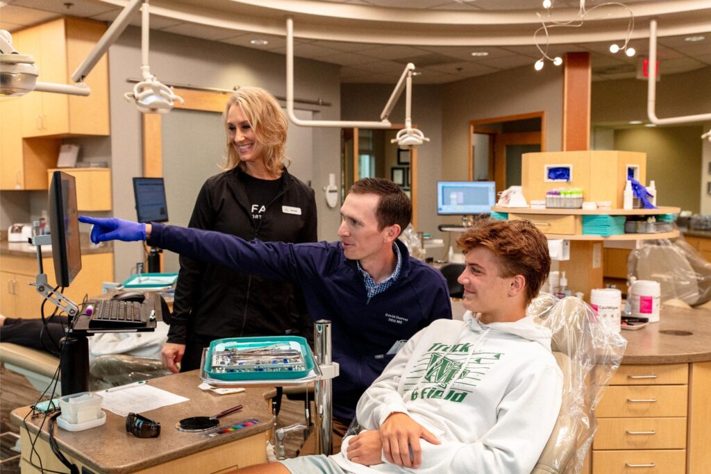 horace orthodontist—chairside consultation with teen patient
