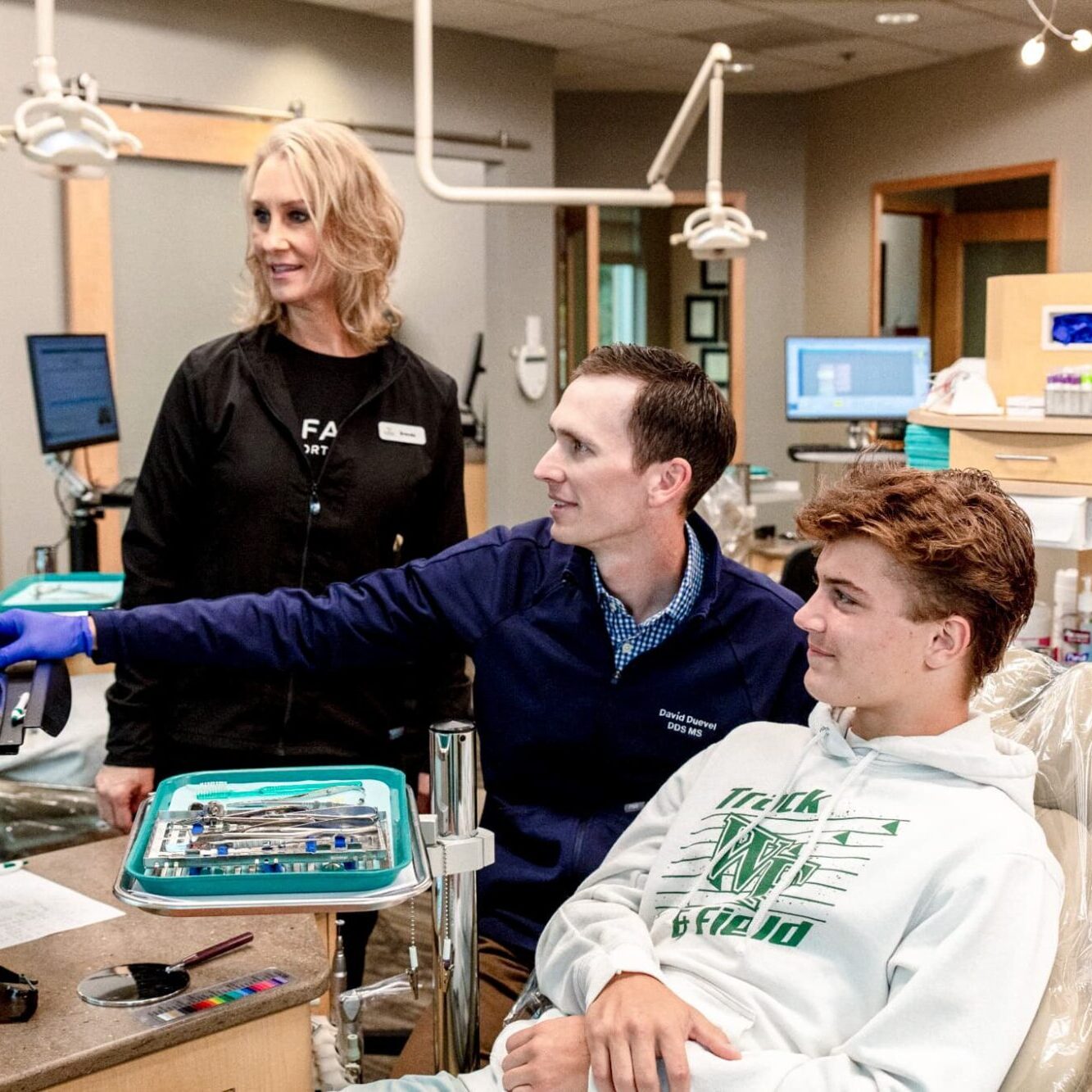 orthodontist fargo—doctor reviewing braces progress on screen
